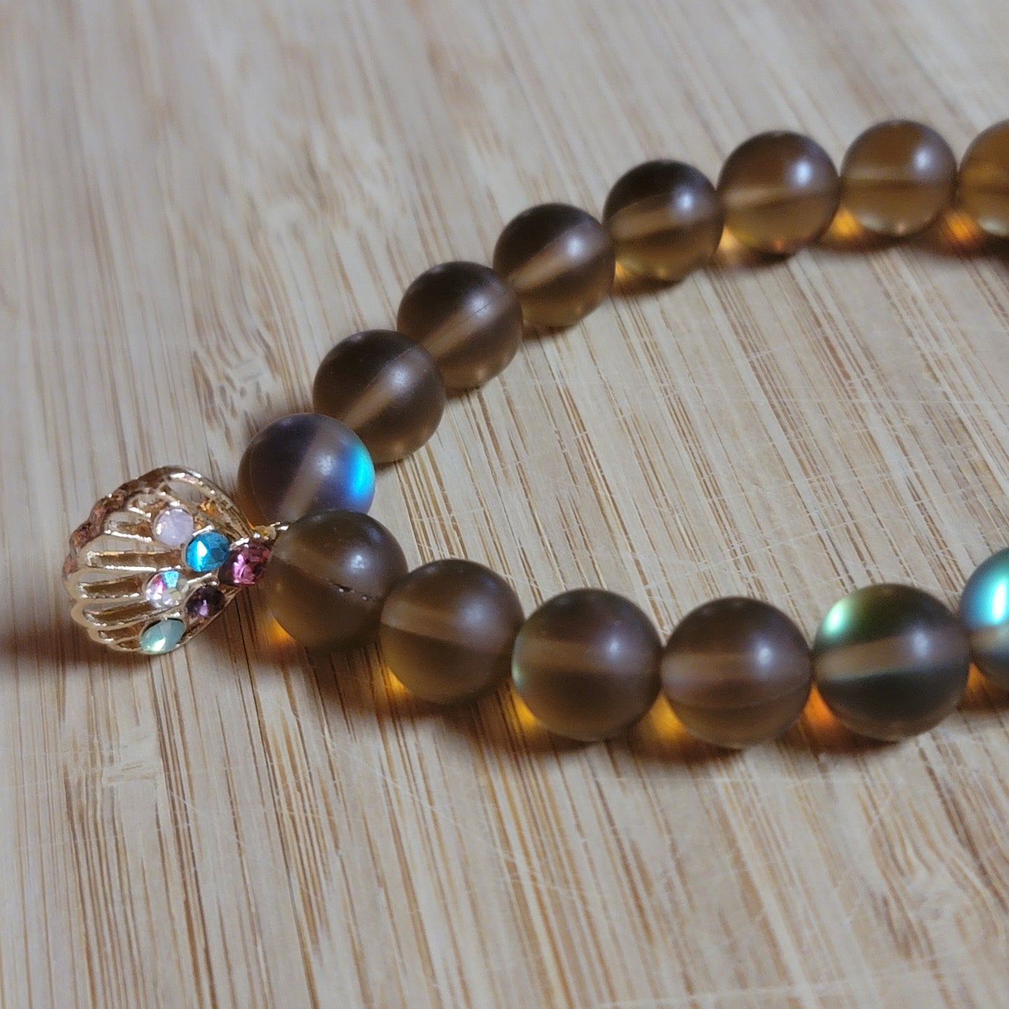 Holographic Glass Bead Bracelet with Seashell Charm