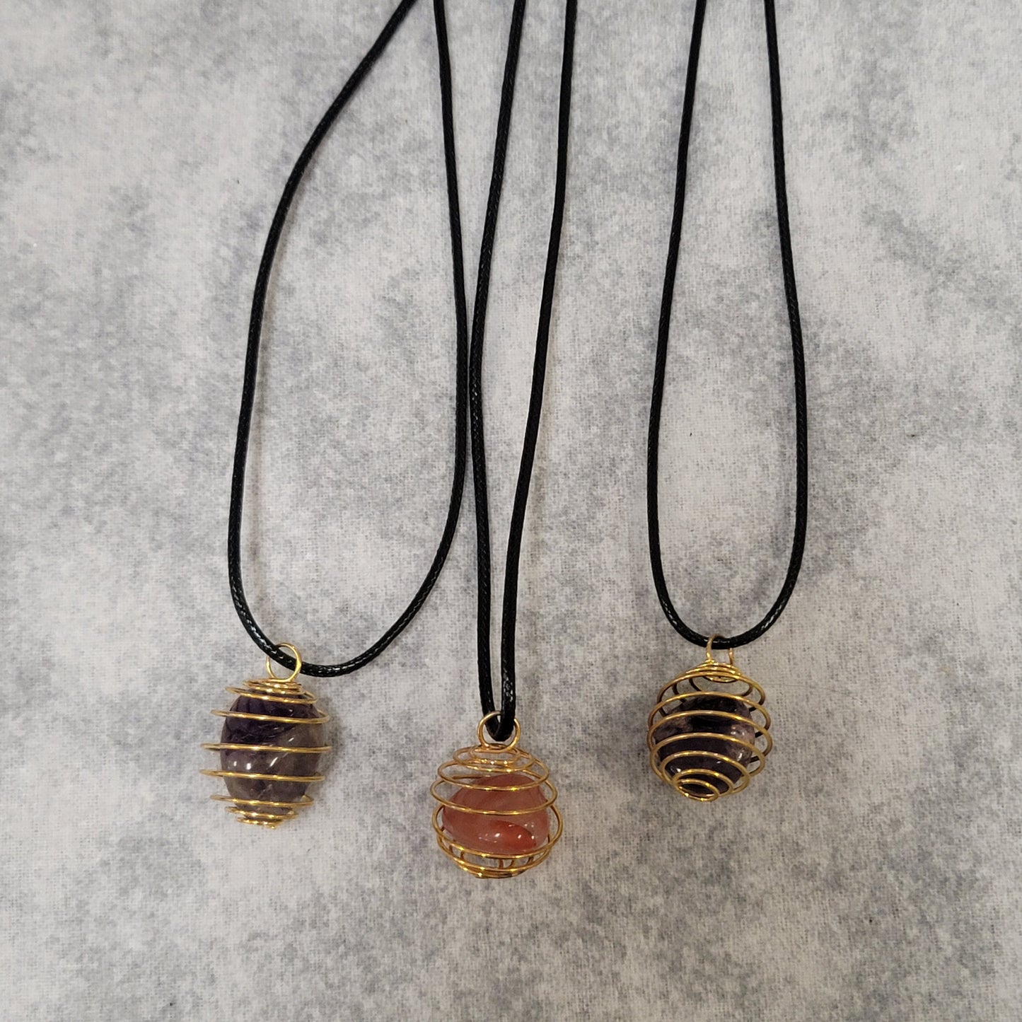 Gold cage pendants