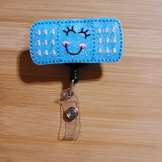 Bandaid Light Blue Glitter Badge Reel